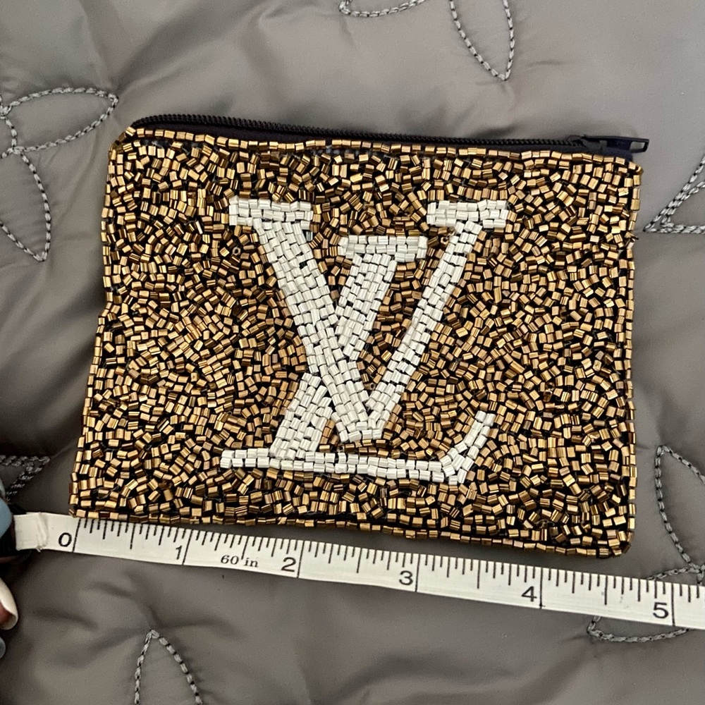 L V beaded change purse